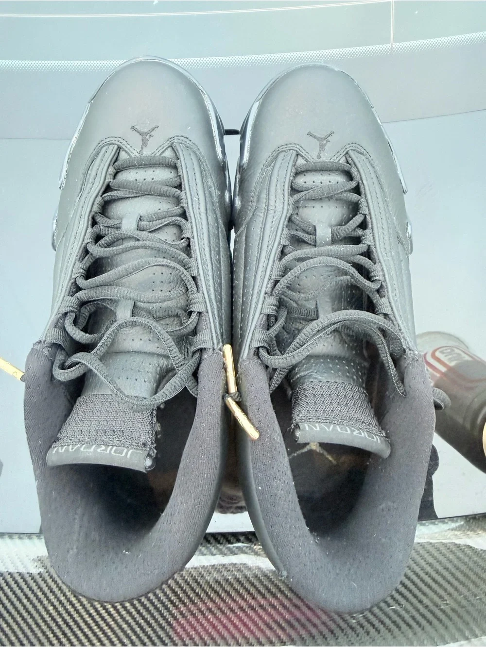 Men's Black Jordan’s Athletic Sneakers with Gold Accents